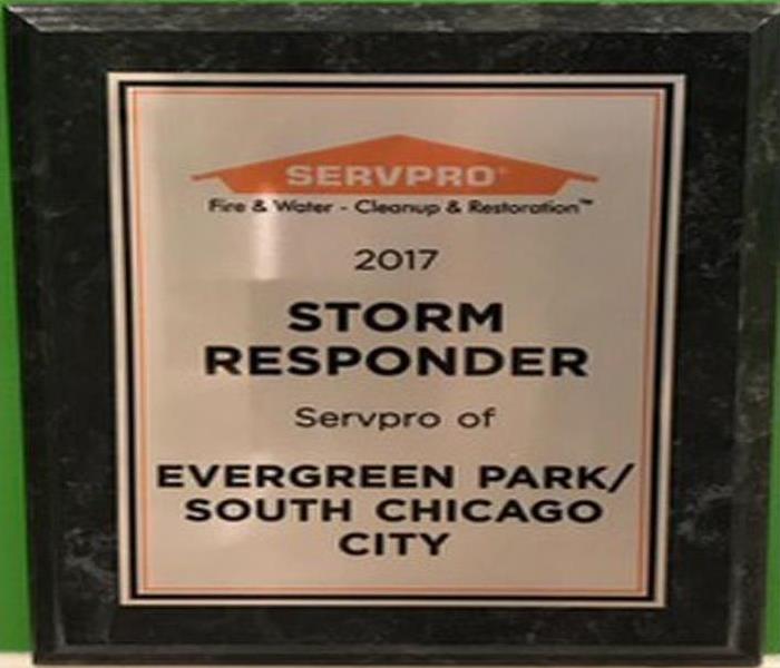 Storm Responder award in a black frame