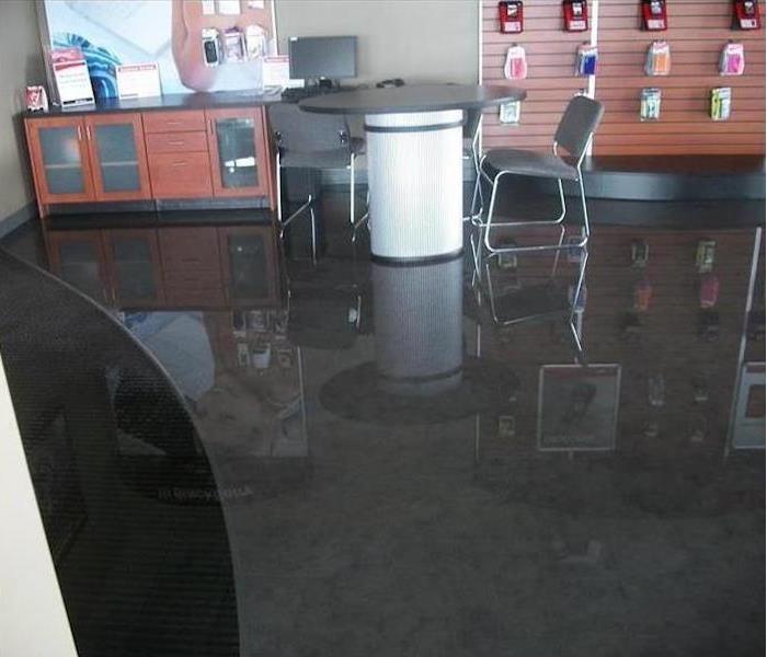 retail store with water covering the floor