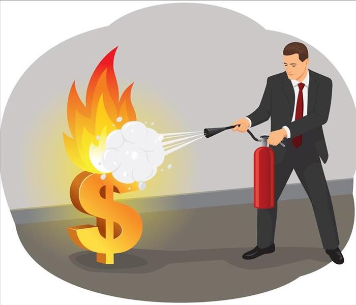 suited man using a fire extinguisher putting out a $ fire